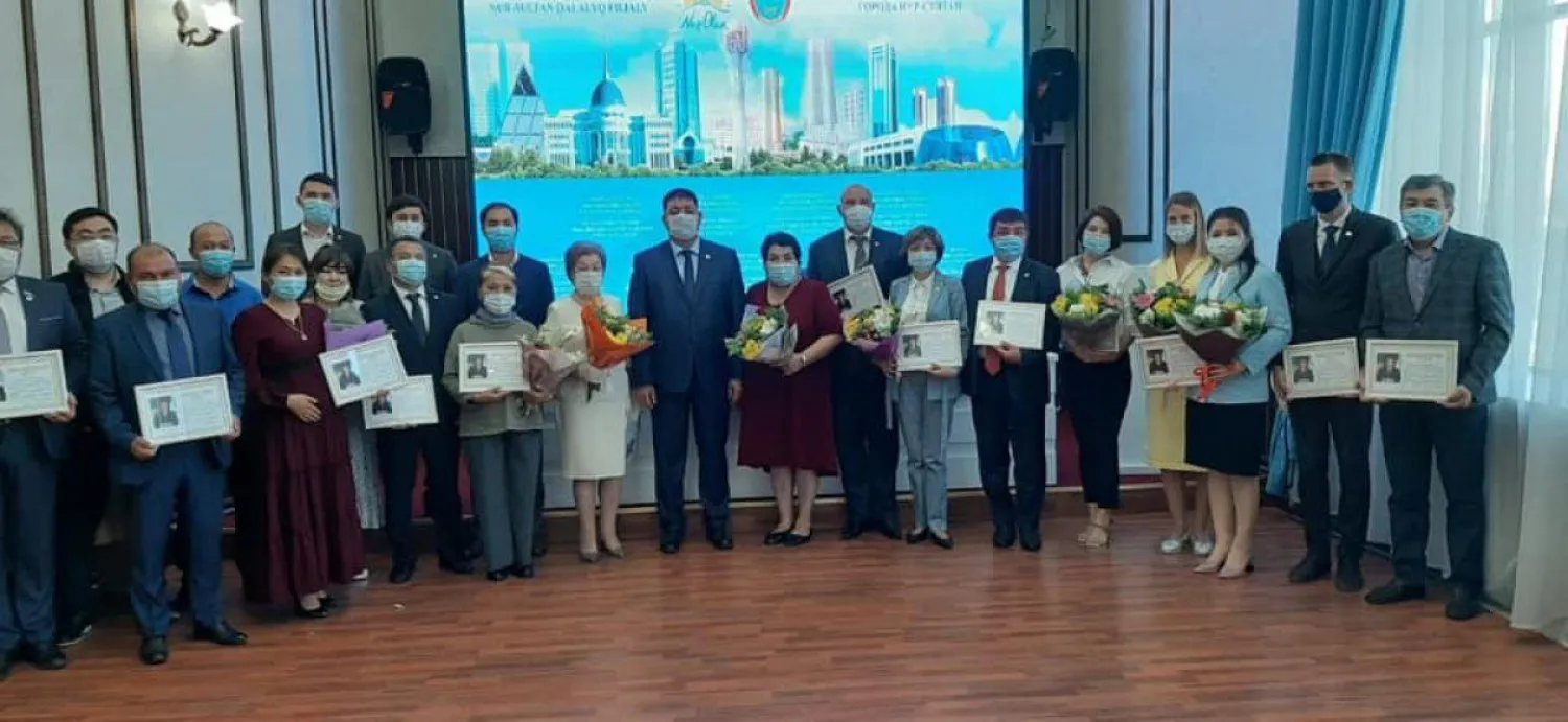 Более 20 активных партийцев наградили в столичном филиале партии Nur Otan