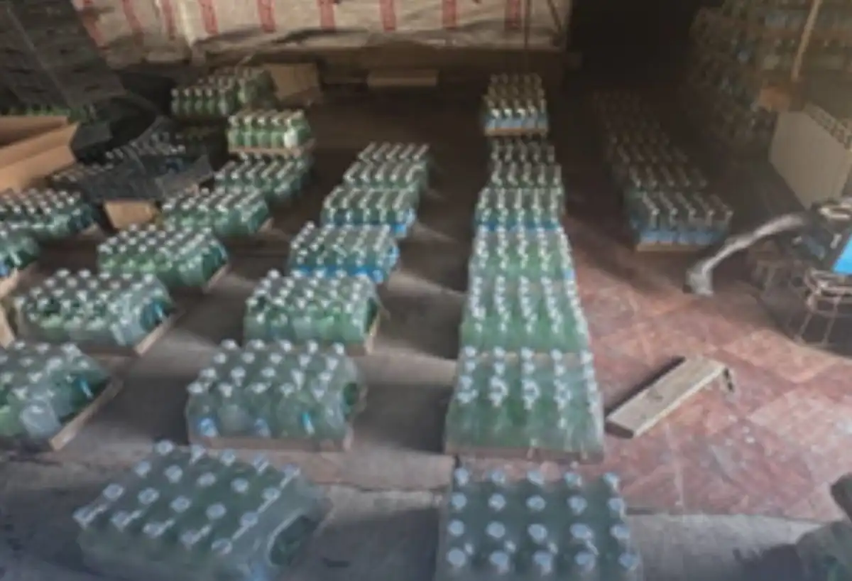 Тонны суррогатного алкоголя изъяли в цехе в Шымкенте